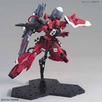 MG Gunner Zaku Warrior Lunamaria en pose aérea con rifle; peana vendida por separado.